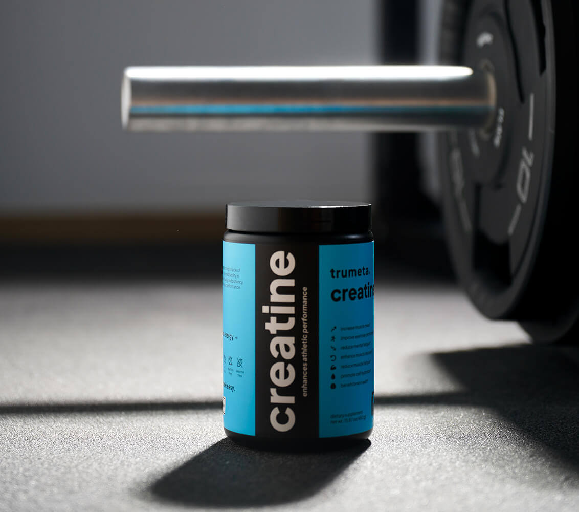 Creatine jar near barbell