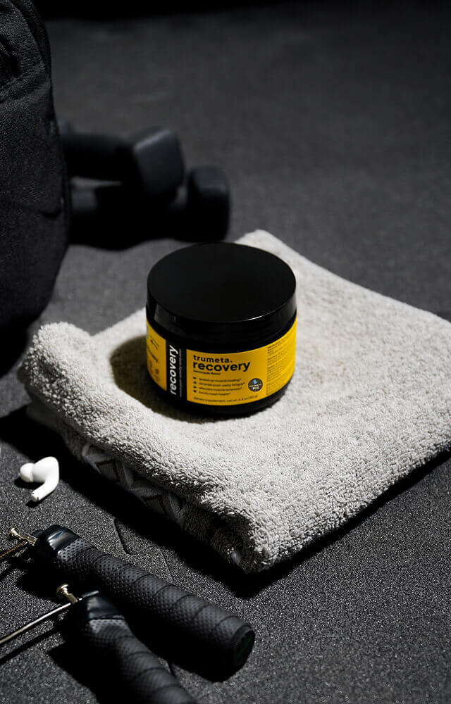 Recovery supplement with towel and dumbbell